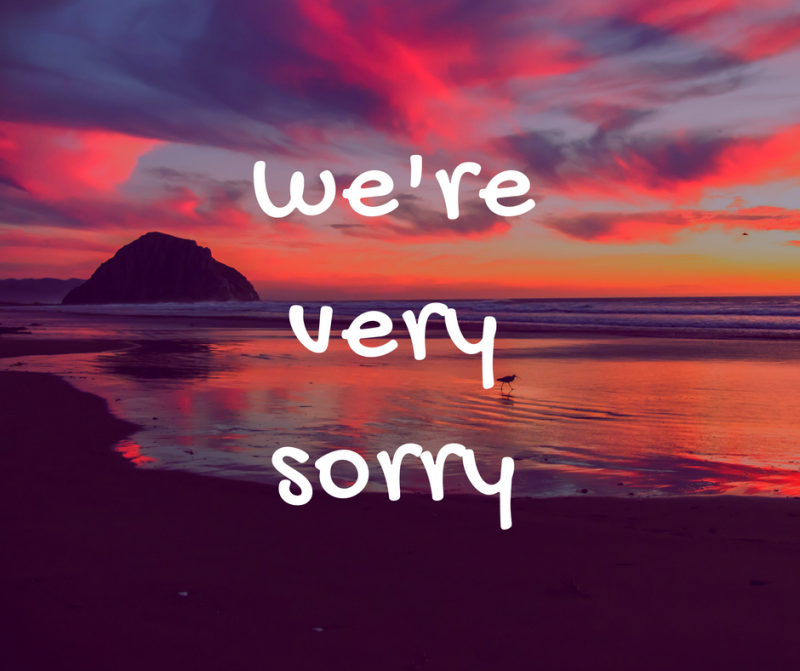 we're very sorry written on a beautiful landscape